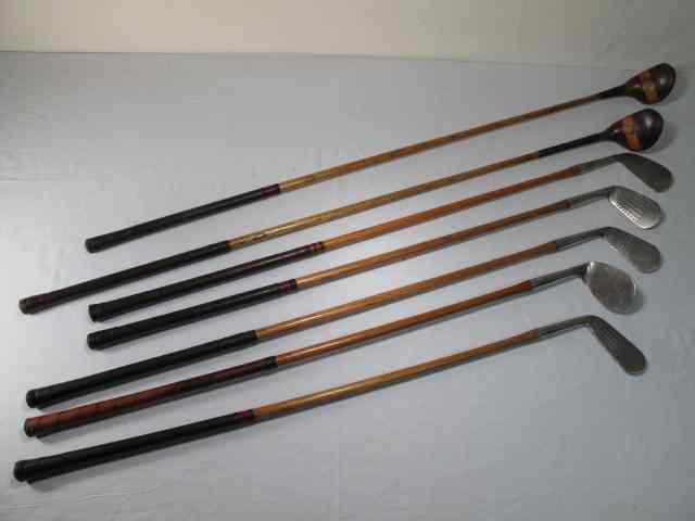 Appraisal: Lot of seven assorted wooden shaft golf clubs Includes Lilly