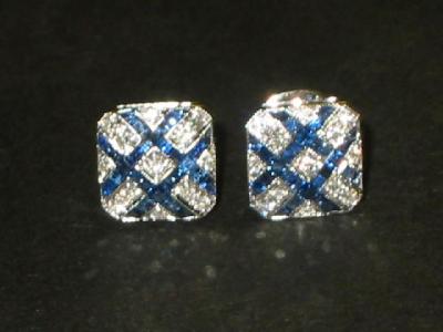 Appraisal: A PAIR OF SAPPHIRE AND DIAMOND EAR STUDS the canted