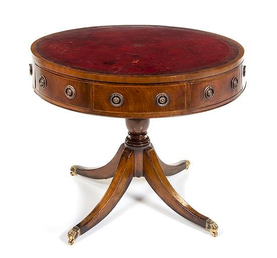 Appraisal: A Regency Style Mahogany Drum Table Height x diameter of