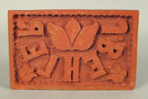 Appraisal: Carved bag stamp ca for J Behler with tulip decoration