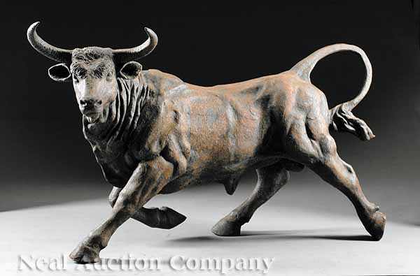 Appraisal: A Large Patinated Cast Iron Figure of a Striding Bull