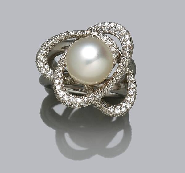 Appraisal: A cultured pearl and diamond ring France cultured pearl measuring