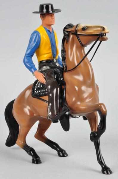 Appraisal: Hartland Gil Favor Horse Rider Description Complete set includes pistol