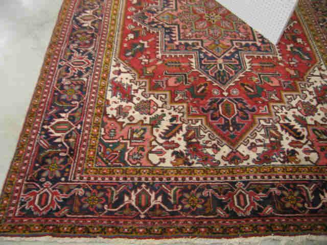 Appraisal: Heriz Persian Handmade Room Size Rug large centeral medallions stylized