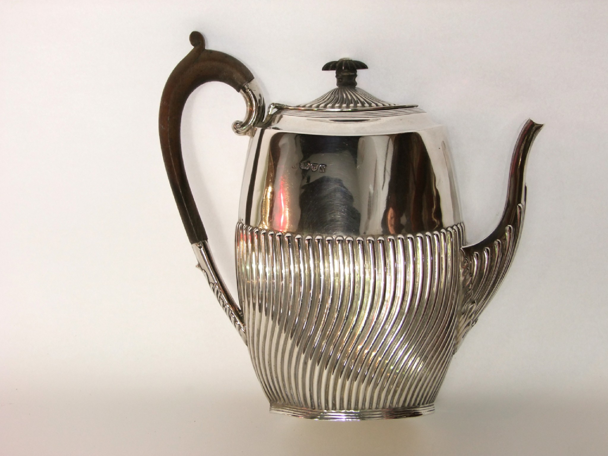 Appraisal: A Victorian silver coffee pot indecipherable maker's mark Chester the