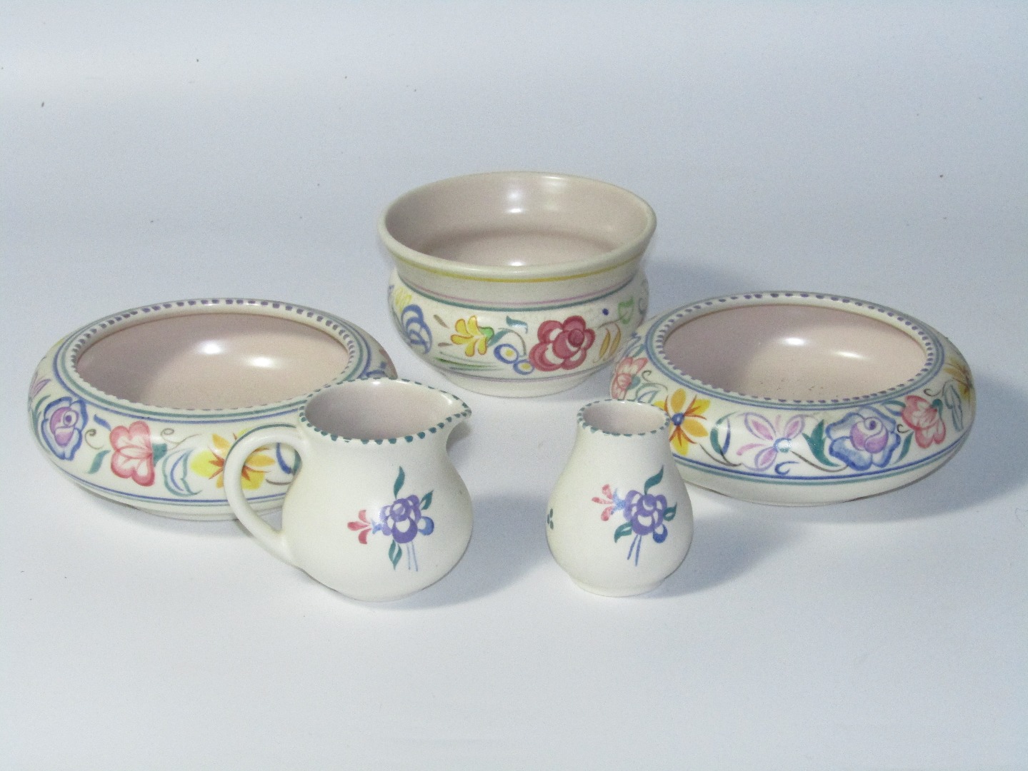 Appraisal: Various Poole pottery to include a compressed bowl with floral