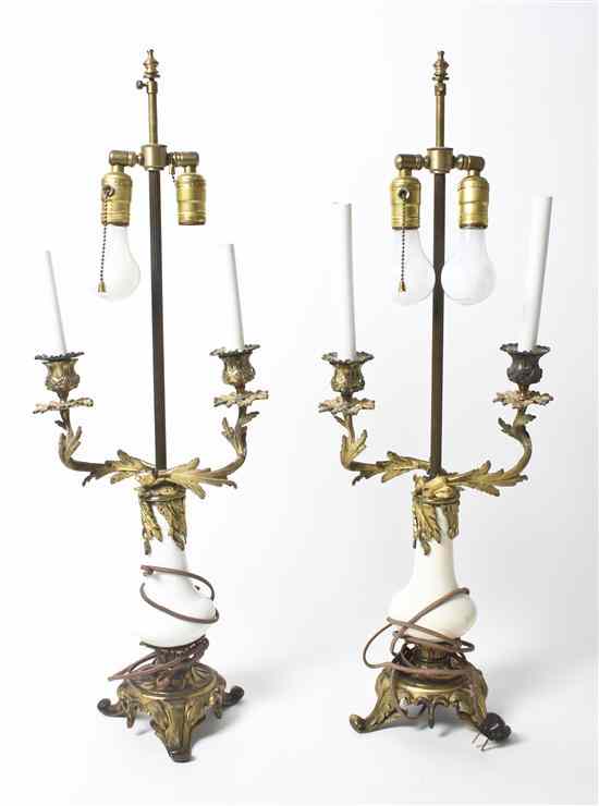 Appraisal: A Pair of Gilt Metal Two-Light Candelabra each having acanthus