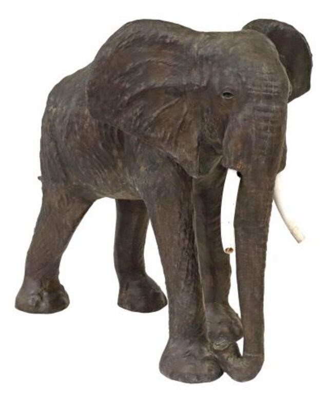 Appraisal: Large standing elephant statue th c wood frame with textured