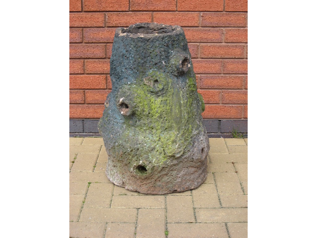 Appraisal: A concrete garden Urn moulded as a tree stump