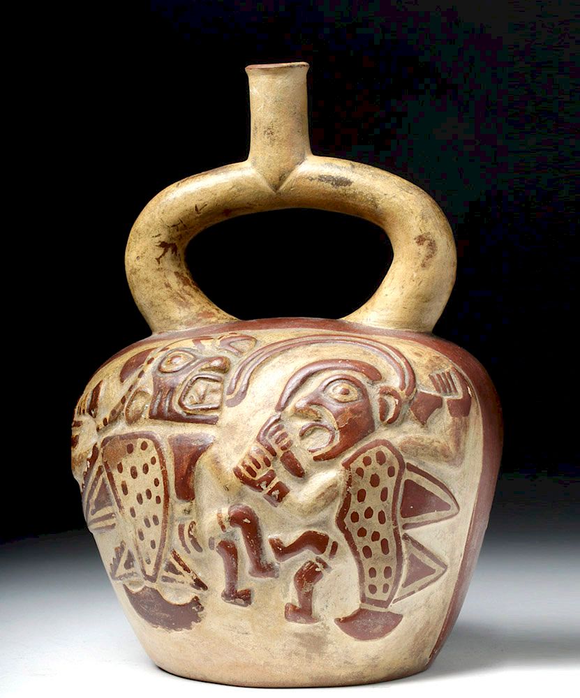 Appraisal: Moche Bichrome Stirrup Vessel Ai Apec Demon Relief Pre-Columbian North