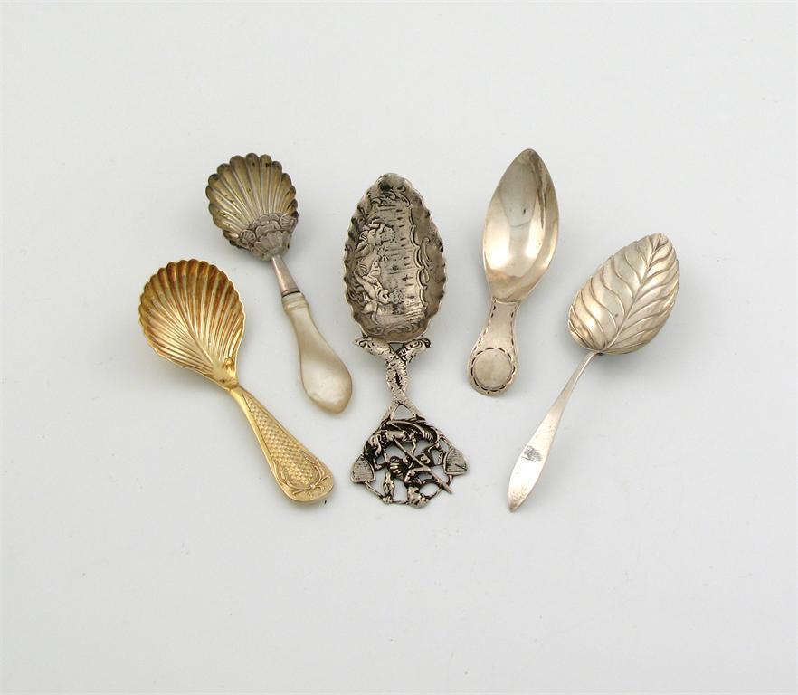 Appraisal: A small collection of five continental silver caddy spoons