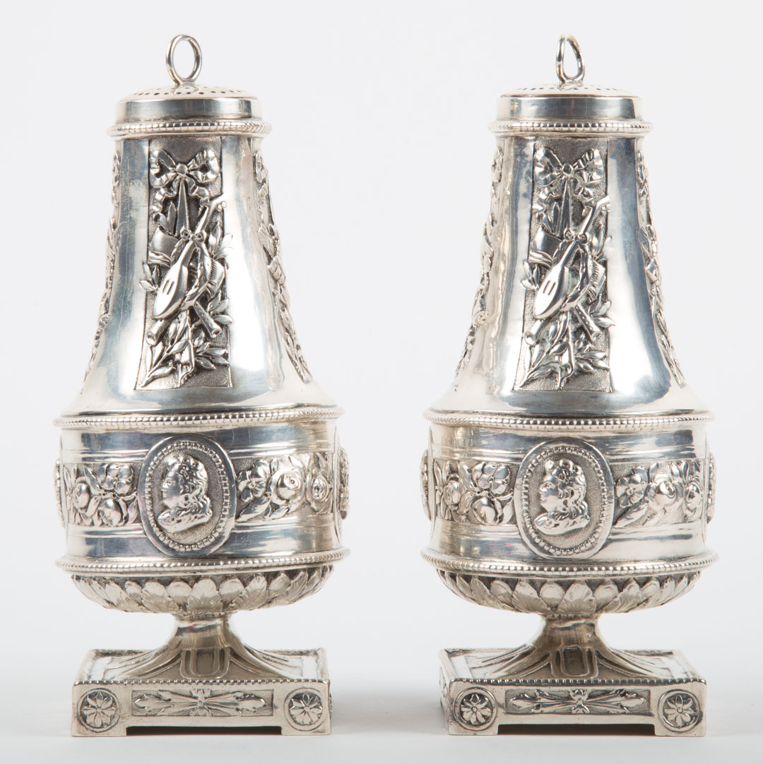 Appraisal: Pair of Louis XVI silver casters in H ozt