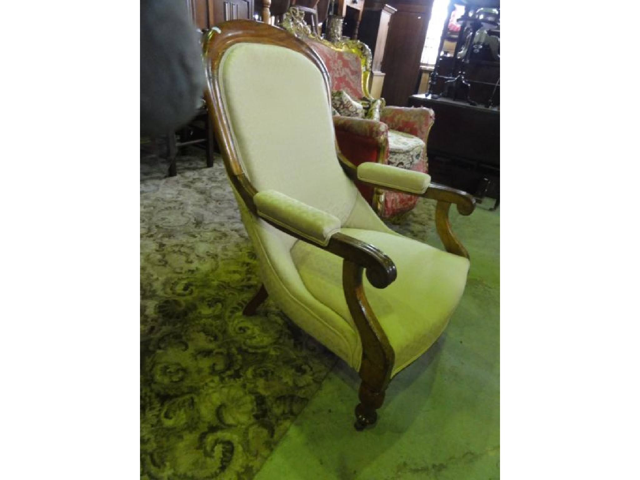 Appraisal: A Victorian spoonback drawing room chair with upholstered seat back