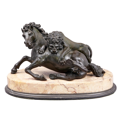 Appraisal: An Italian bronze sculpture of a lion attacking a horse