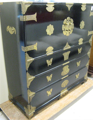 Appraisal: CHINESE CABINET-ON-CHEST th century The front featuring a pair of