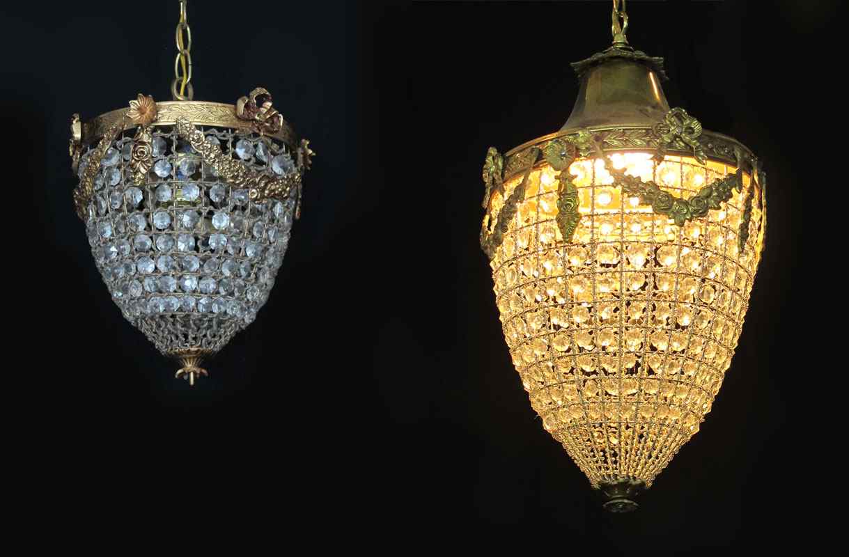 Appraisal: TWO BRASS AND CRYSTAL PENDANT CHANDELIERS On extra long chains