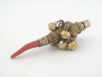 Appraisal: A George IV silvergilt child's rattle with a coral teether