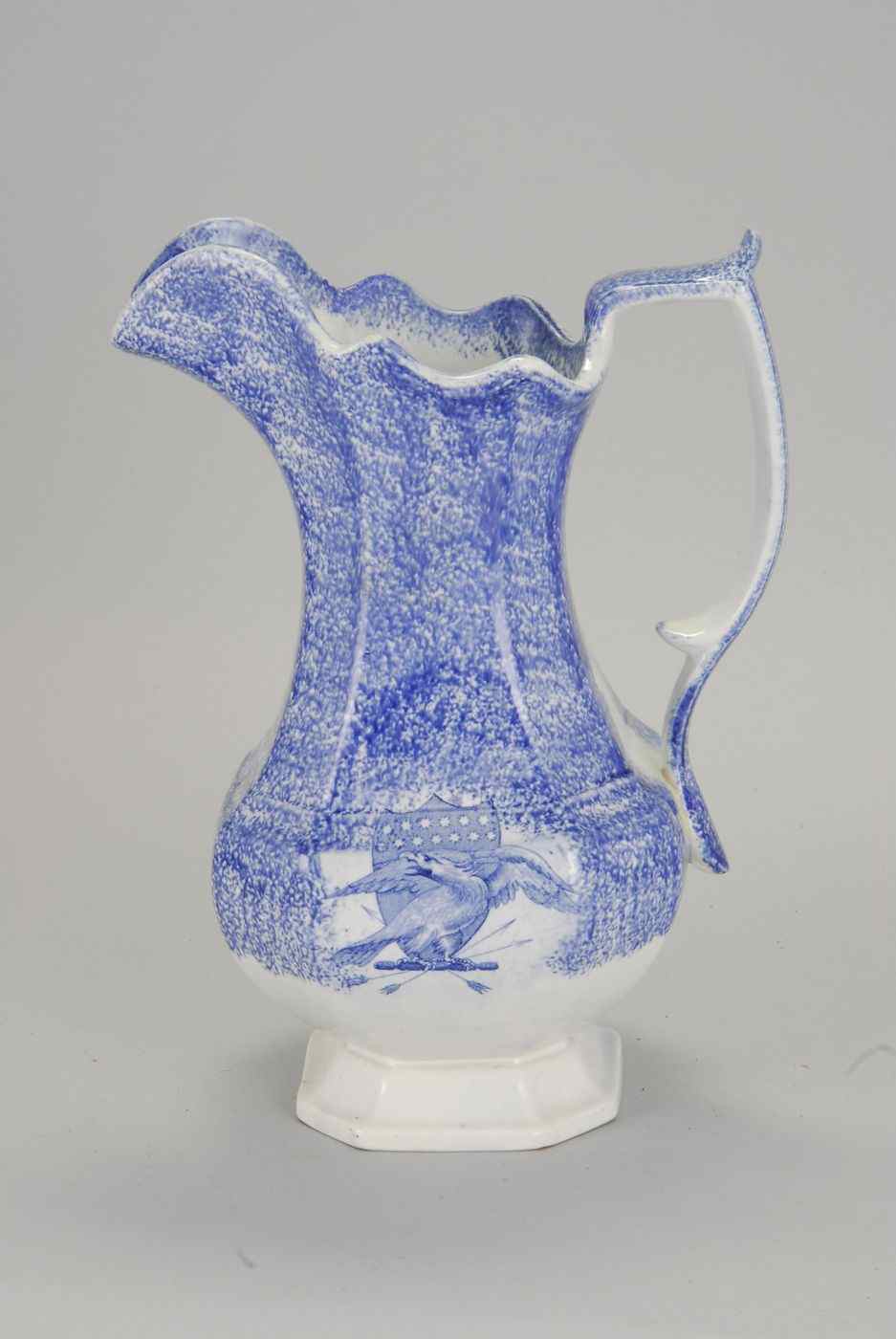 Appraisal: SPATTERWARE WASH PITCHER th CenturyIn light blue with eagle and