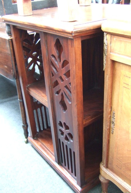 Appraisal: A th century hardwood revolving bookstand with pierced sides cm