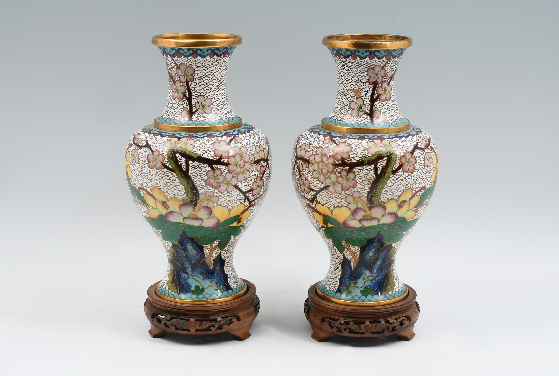 Appraisal: PAIR OF CHINESE CLOISONNE VASES Pair of opposing white ground