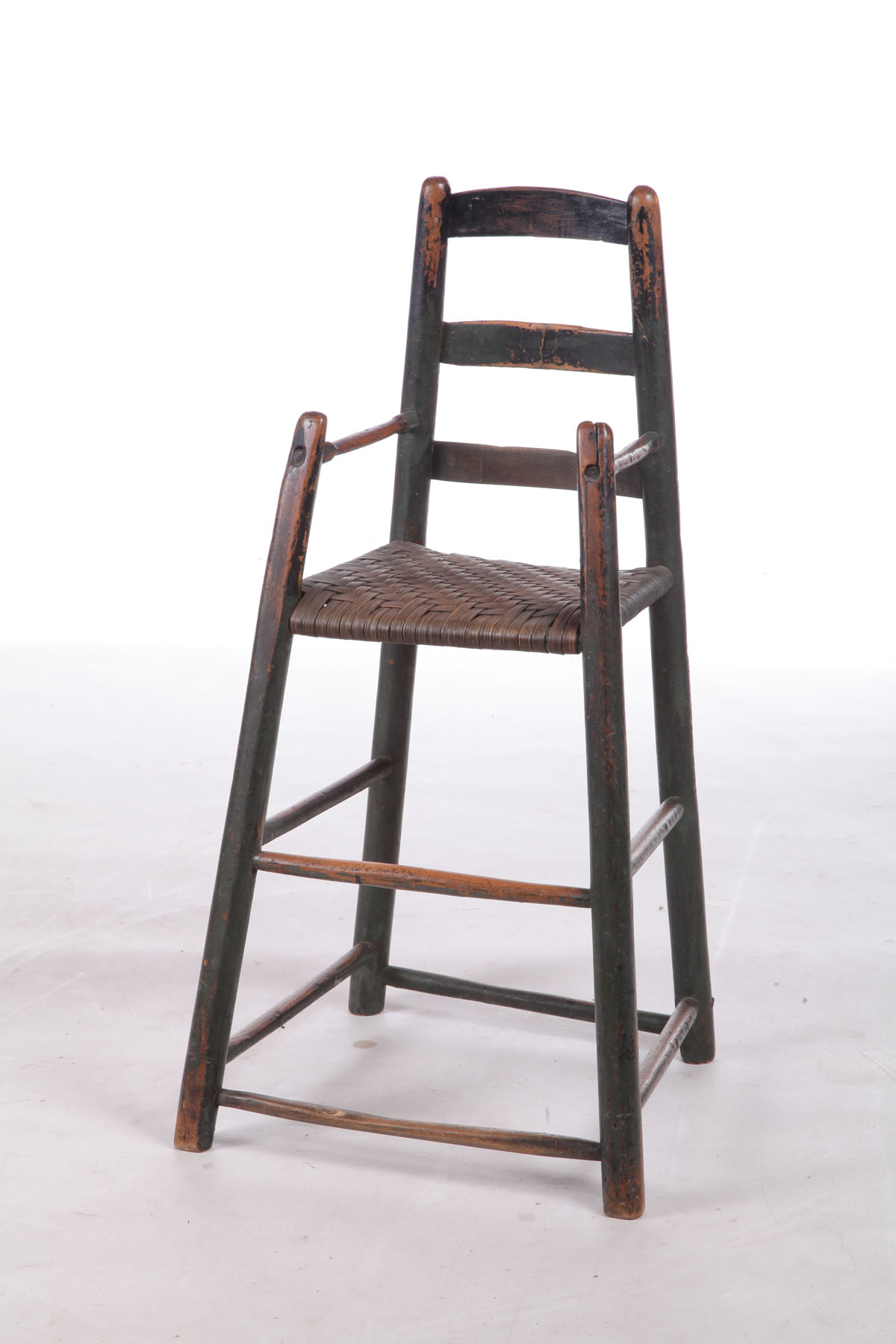 Appraisal: LADDERBACK HIGH CHAIR American - mixed woods Three slats and