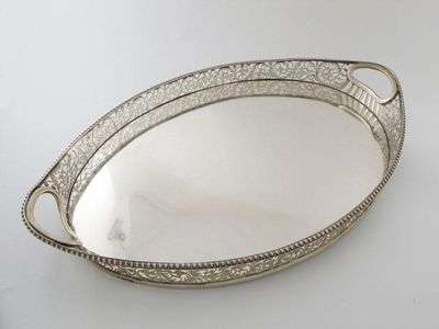 Appraisal: An Edwardian silver two-handled gallery tray oval form the gallery