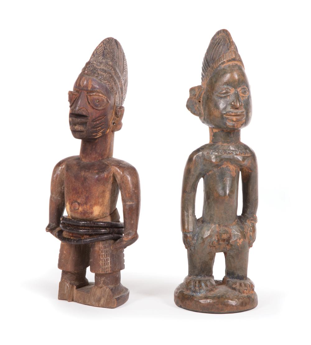 Appraisal: Two African Carved Wood Ibeji Figures Yoruba Nigeria taller h