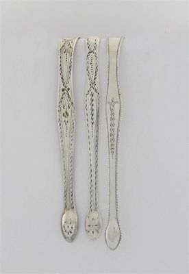 Appraisal: A pair of George III feather edge tongs and two