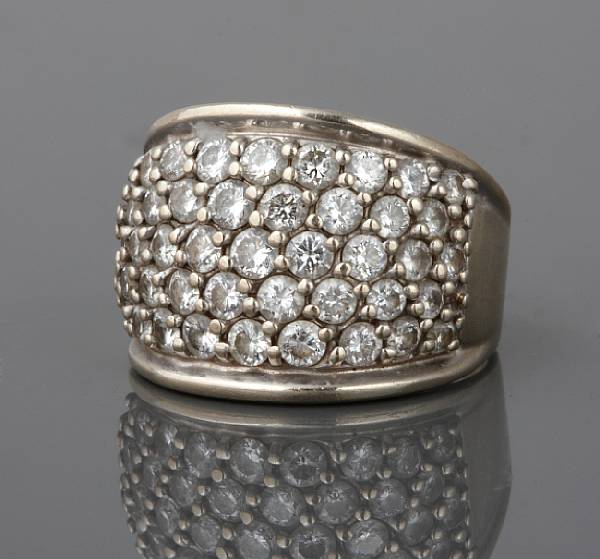 Appraisal: A diamond and k white gold band estimated total diamond