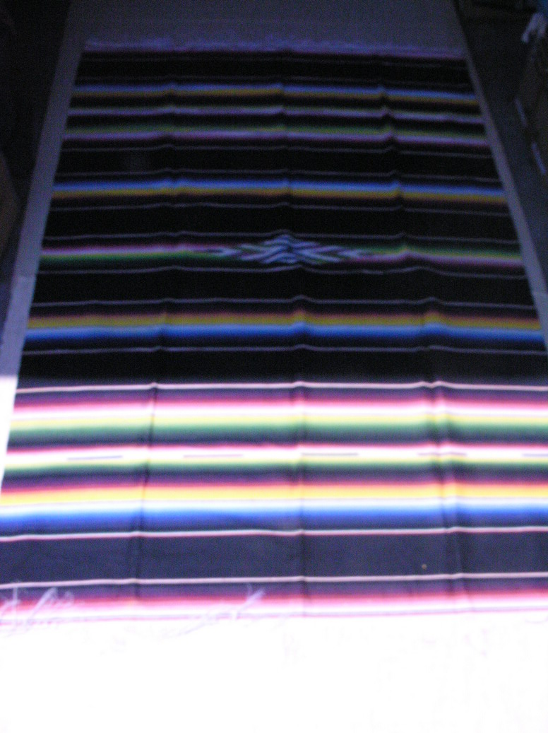 Appraisal: EARLY MEXICAN SERAPE TEXTILE Finely woven- fringe in tack Size