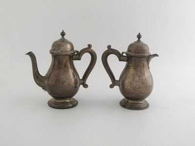 Appraisal: A pair of modern baluster cafe au lait pots with