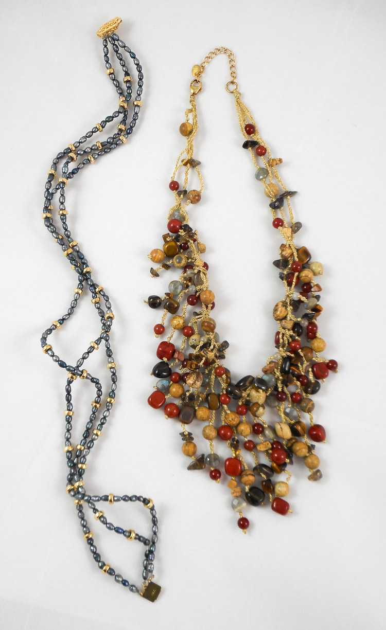 Appraisal: TWO BEAD NECKLACES including a inch triple strand necklace strung