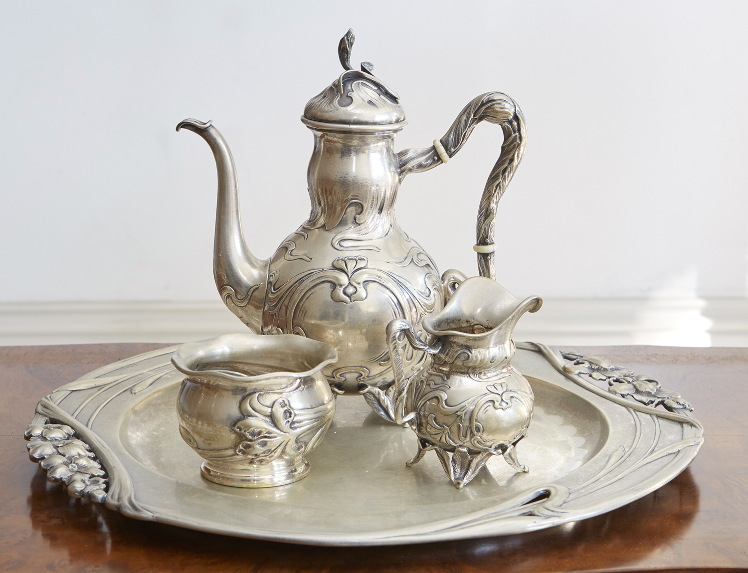 Appraisal: A FINE AUSTRIAN ART NOUVEAU SILVER THREE PIECE COFFEE SERVICE