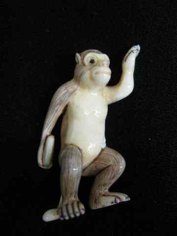 Appraisal: Carved Ivory Netsuke of a Monkey ''Discthrower'' fancy polychrome -