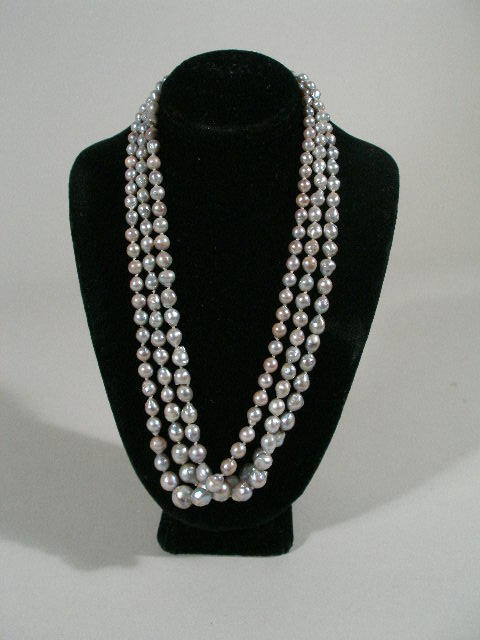 Appraisal: Triple Strand of Japanese Black Pearls natural pearls have been