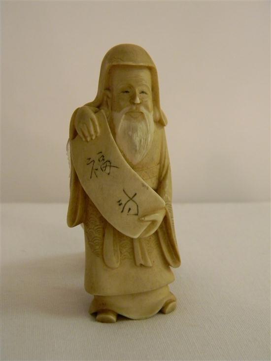 Appraisal: Japanese th C ivory figure of an old man holding