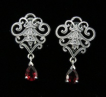 Appraisal: A Pair of Victorian Style Sterling Silver Earrings with Gemstones