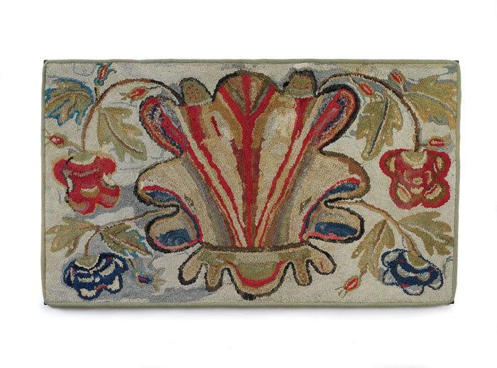 Appraisal: AMERICAN FLORAL HOOKED RUG WITH STYLIZED ANTHEMION AND SMALLER FLOWERS