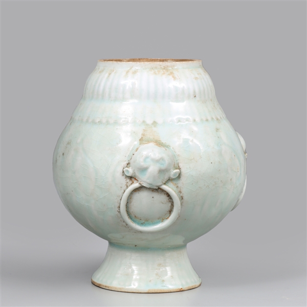 Appraisal: Chinese celadon vase with figural ring holder relief around perimeter