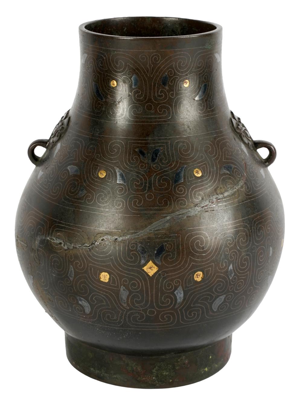 Appraisal: CHINESE BRONZE VASEunsigned of archaic shape with gilt and silver