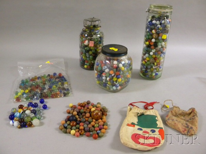 Appraisal: Collection of Glass and Clay Marbles in three glass jars