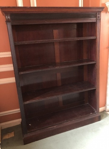 Appraisal: An Edwardian mahogany open bookcase with reeded frieze and uprights