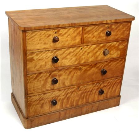 Appraisal: A Victorian satin pine chest the rounded top over two