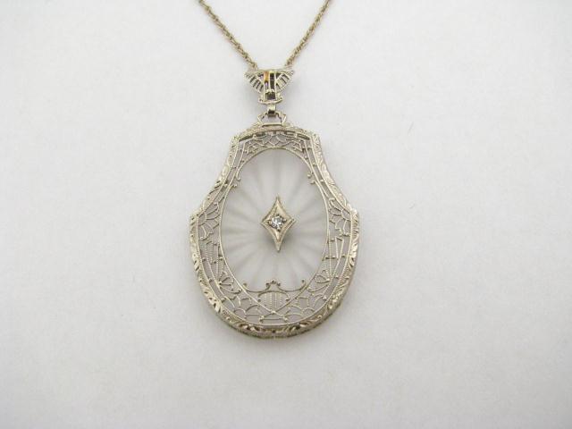 Appraisal: K White Gold Crystal and Diamond Pendant The bezel is