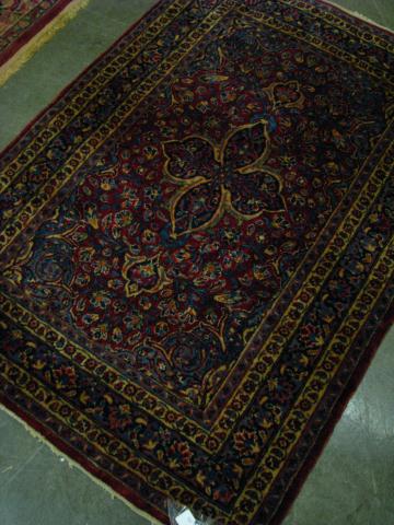 Appraisal: Semi-Antique Persian area rug x maroon and navy with center