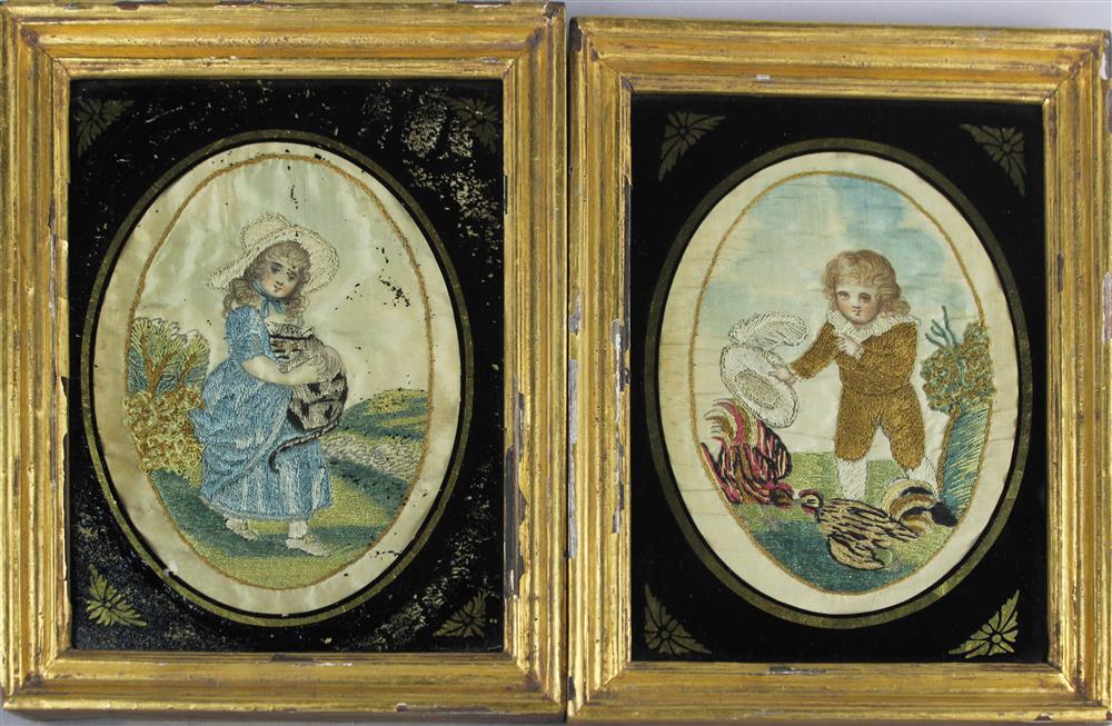 Appraisal: PAIR OF SILKWORK OVAL EMBROIDERIES WITH BOY AND GIRL TH