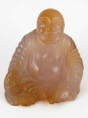 Appraisal: A Chinese hardstone carving of a seated Buddha approx cm