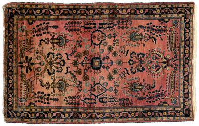 Appraisal: Sarouk rug repeating floral designs on pale salmon field ft