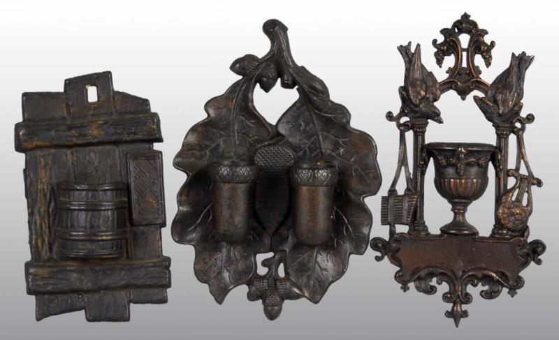 Appraisal: Lot of Figural Cast Iron Match Vesta Holders Description All