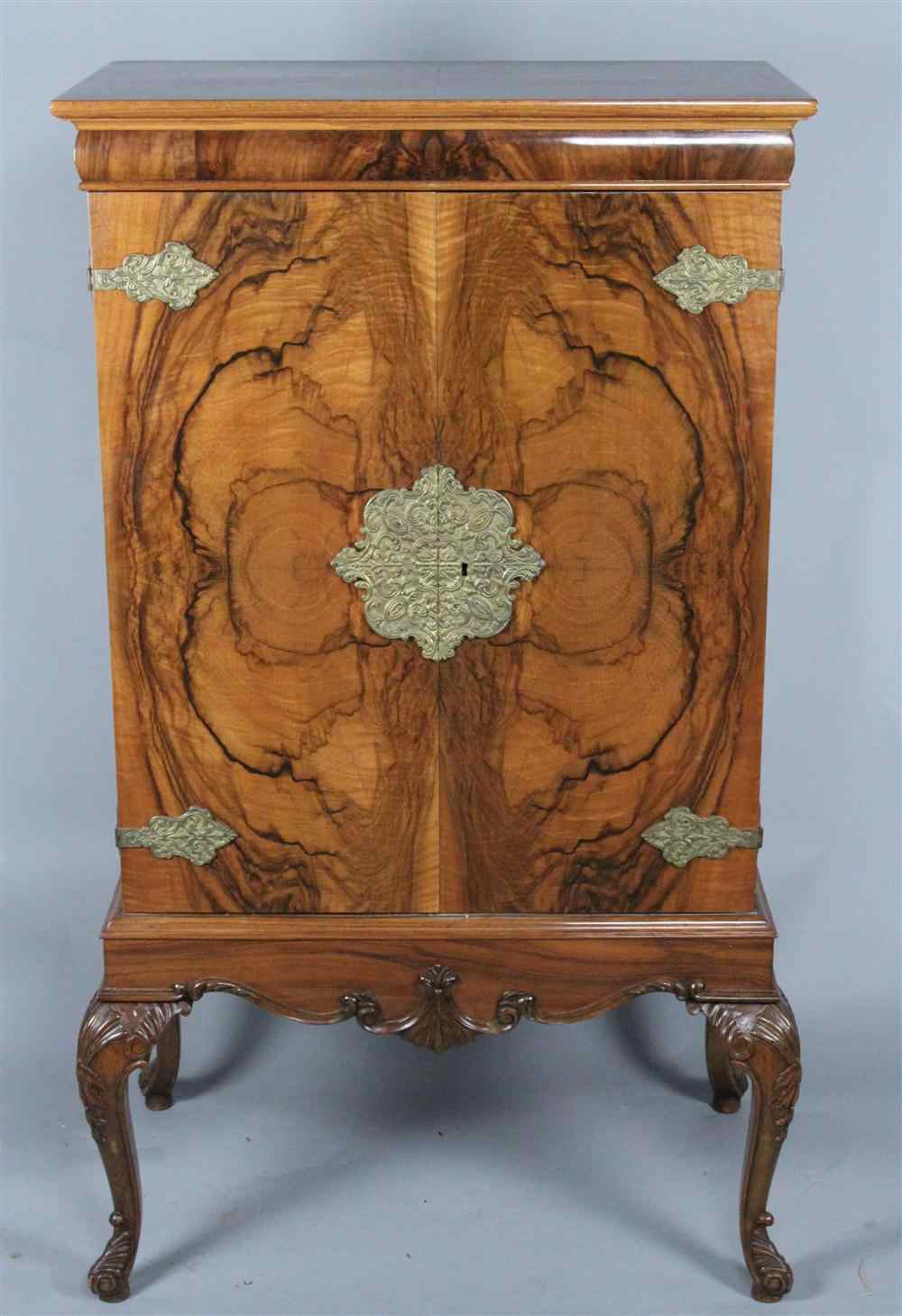 Appraisal: BURL WALNUT BAR CABINET TH CENTURY with rectangular top above